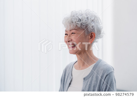 A senior woman smiling lively 98274579