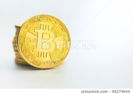 Heap of bitcoin coins. 98274649