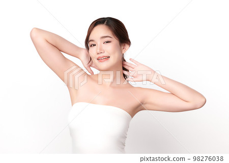 Beautiful Young Asian woman lifting hands up to show off clean and hygienic armpits or underarms on white background, Smooth armpit cleanliness and protection concept Beautiful Young Asian woman lifting hands up to show off clean and hygienic armpits or underarms on white background, Smooth armpit cleanliness and protection concept 98276038