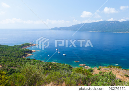 Corsica island on a sunny day, Cupabia gulf. Summer landscape Corsica island on a sunny day, Cupabia gulf. Summer landscape 98276351