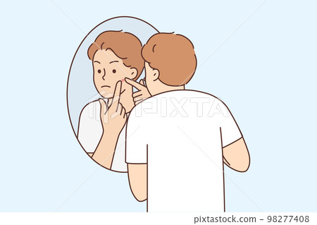 Young man stressed with pimple on face  98277408