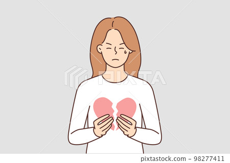 Unhappy woman hold broken heart  98277411