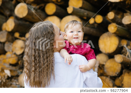 Sweet moments of life. Mom and child relax in the summer outdoors Sweet moments of life. Mom and child relax in the summer outdoors 98277904