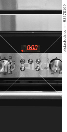 Modern kitchen has an oven and the control panel Modern kitchen has an oven and the control panel 98278169