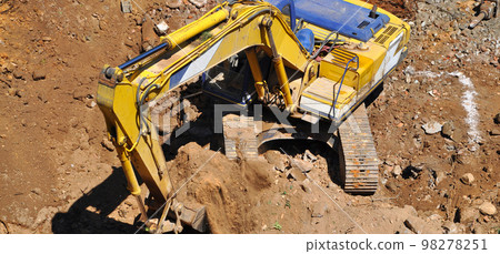 Excavator continues to work at the construction site Excavator continues to work at the construction site 98278251