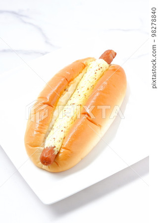 Side dish bread with plenty of mustard on coarse sausage 98278840