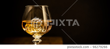 Glass of scotch whiskey and ice Glass of scotch whiskey and ice 98279266