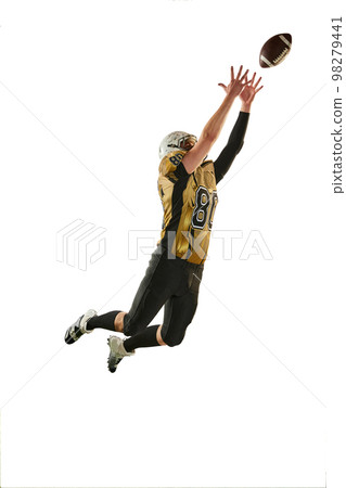 Catching ball in a jump. Man, american football player in motion, training over white studio background. Concept of sport, competition 98279441