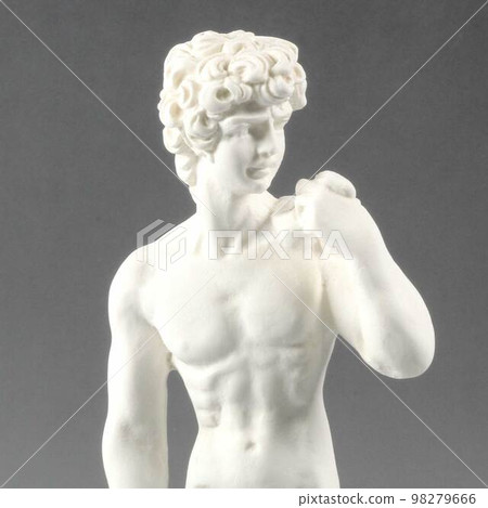 Torso to the waist of a man plastic figurine of white color Torso to the waist of a man plastic figurine of white color 98279666