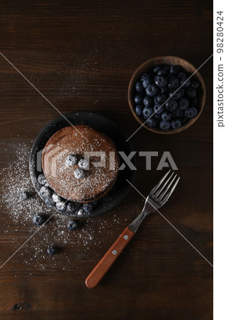 Concept of sweet food, chocolate pancakes, top view 98280424