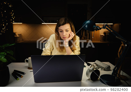 Tired woman works from home use laptop at night, overwork burnout, freelancer works remote at home workplace Tired woman works from home use laptop at night, overwork burnout, freelancer works remote at home workplace 98282400