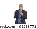 mature man in a suit with beard dance on a white background 98283772