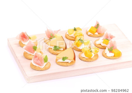 Hors d'oeuvre prosciutto ham cheese crackers various Hors d'oeuvre prosciutto ham cheese crackers various 98284962