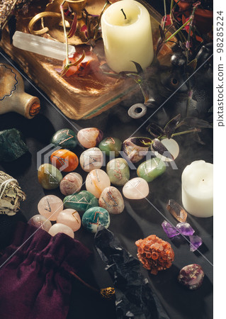 Esoteric Occult Altar with Runes Stones on Black Esoteric Occult Altar with Runes Stones on Black 98285224