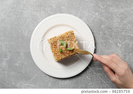 Concept of sweets, honey cake, top view Concept of sweets, honey cake, top view 98285759