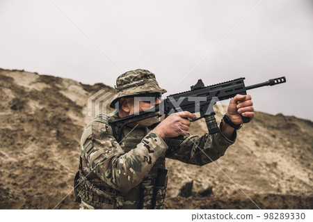 Soldier with a rifle on a shooting range 98289330