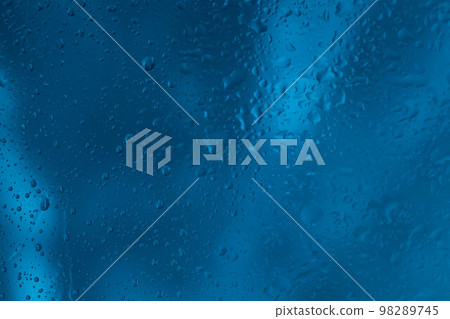 Drops of rain water droplets on glass 98289745