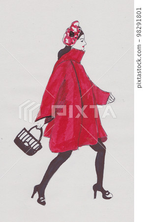 girl in a red coat walking down the street 98291801