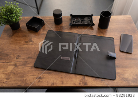 office desk with stationery leather folder for papers and documents office desk with stationery leather folder for papers and documents 98291928