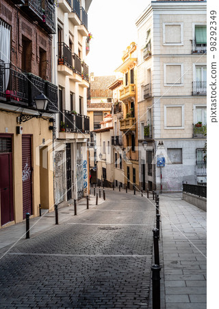 Traditional Street in the Lavapies Neighborhood in central Madrid 98292349
