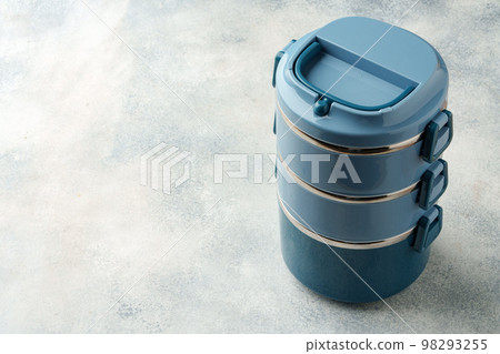 New plastic lunch box on a gray background New plastic lunch box on a gray background 98293255