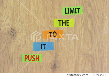 Push it to the limit symbol. Concept words Push it to the limit on colored paper. Beautiful wooden table wooden background. Business push it to the limit concept. Copy space. Push it to the limit symbol. Concept words Push it to the limit on colored paper. Beautiful wooden table wooden background. Business push it to the limit concept. Copy space. 98293515