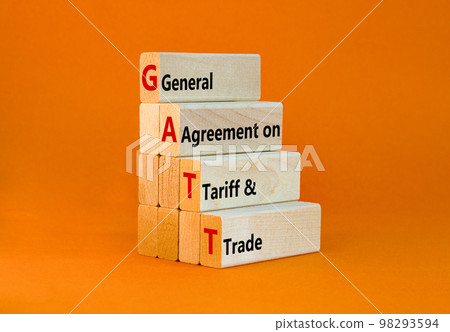 GATT symbol. Concept words GATT general agreement on tariff and trade on wooden block on beautiful orange background. Business GATT general agreement on tariff and trade concept. Copy space. 98293594