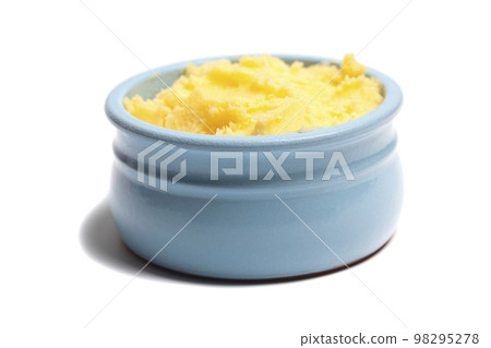 Ghee in a butter dish isolate on a white background 98295278