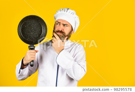 cooking lunch in kitchen. my profession. baker with saucepan pot. catering. Chef man holds kitchenware. happy cook man hold frying pan. Chef in uniform cooking soup. restaurant kitchen. copy space cooking lunch in kitchen. my profession. baker with saucepan pot. catering. Chef man holds kitchenware. happy cook man hold frying pan. Chef in uniform cooking soup. restaurant kitchen. copy space 98295578