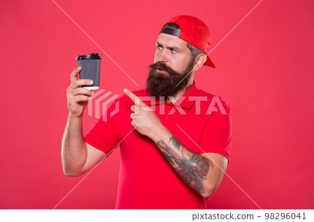 Cafe barista hold coffee cup. Coffee to go. Cafe stuff red uniform with cap serving drink. Hot beverage. Hipster work at third wave coffee industry. Modern methods brewing coffee. Alternative concept 98296041