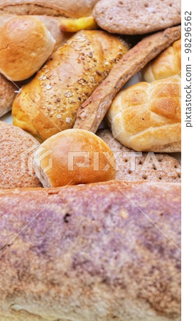 Fresh fragrant bread on the table. Food concept 98296562