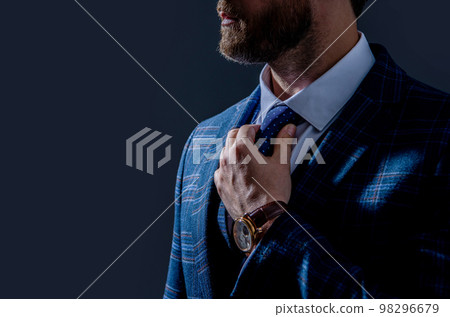 cropped view of businessperson in wristwatch and suit. businessperson in wristwatch isolated on grey 98296679