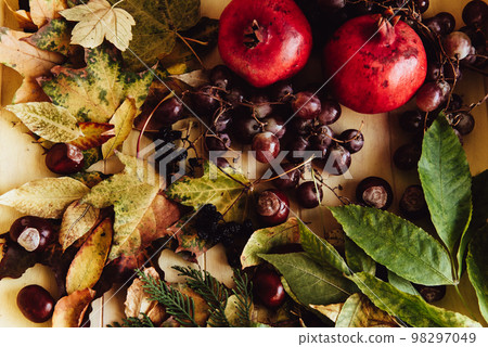 Autumn still life. apple, pumpkin, pomegranate, viburnum, leaves. Flatlay background 98297049
