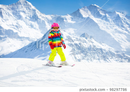Ski and snow fun. Child in winter mountains. Ski and snow fun. Child in winter mountains. 98297786
