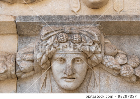 Sculpted Greek mask recovered from the ruins of the theater of Aphrodisias ancient city Aydin, Turkey Sculpted Greek mask recovered from the ruins of the theater of Aphrodisias ancient city Aydin, Turkey 98297857