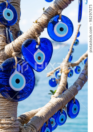 Evil eye beads closeup. Nazar beads. Turkish superstition and tourist souvenir, Grand Bazaar, Istanbul, Turkey 98297875
