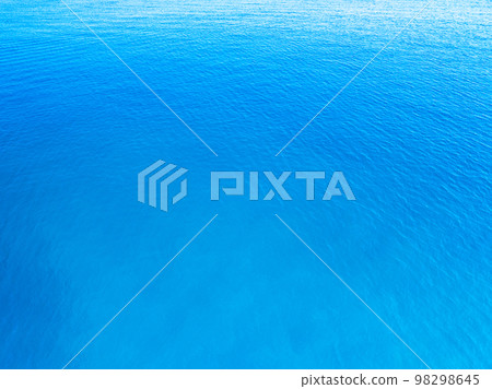 Blue Sea surface aerial view,Bird eye view photo of waves and water surface texture,Open sea background, Beautiful nature Amazing view blue sea background Blue Sea surface aerial view,Bird eye view photo of waves and water surface texture,Open sea background, Beautiful nature Amazing view blue sea background 98298645