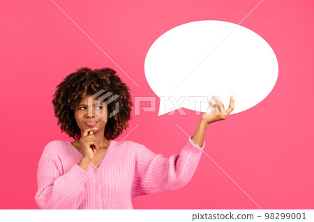Pensive millennial african american curly woman in casual hold abstract cloud, bubble for thoughts and words 98299001