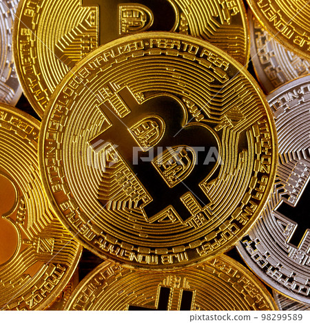 Many golden bitcoins. Cryptocurrency and virtual money concept Many golden bitcoins. Cryptocurrency and virtual money concept 98299589
