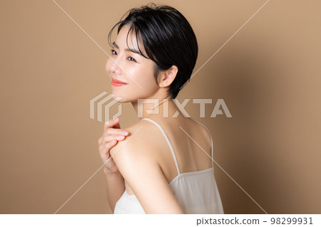 A woman with short hair A woman with short hair 98299931