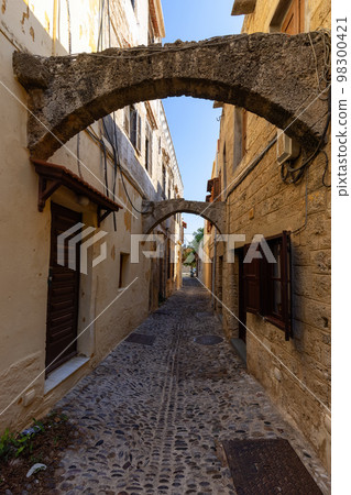 Streets and Residential Homes in the historic Old Town of Rhodes, Greece 98300421