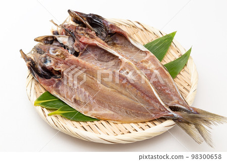 Dried horse mackerel on a colander 98300658