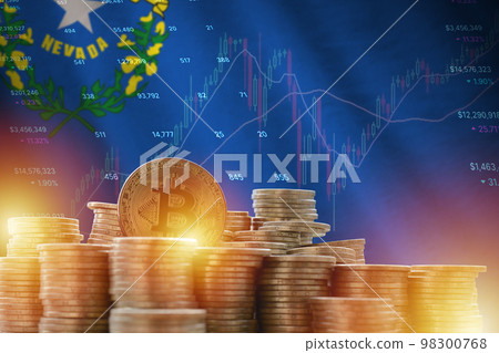 Nevada US state flag and big amount of golden bitcoin coins and trading platform chart. Crypto currency Nevada US state flag and big amount of golden bitcoin coins and trading platform chart. Crypto currency 98300768