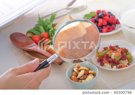 Image of examining ingredients of food Image of examining ingredients of food 98300796