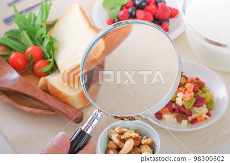 Image of examining ingredients of food Image of examining ingredients of food 98300802