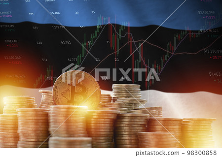 Estonia flag and big amount of golden bitcoin coins and trading platform chart. Crypto currency Estonia flag and big amount of golden bitcoin coins and trading platform chart. Crypto currency 98300858