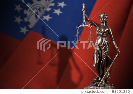 Myanmar flag with statue of lady justice and judicial scales in dark room. Concept of judgement and punishment 98301220