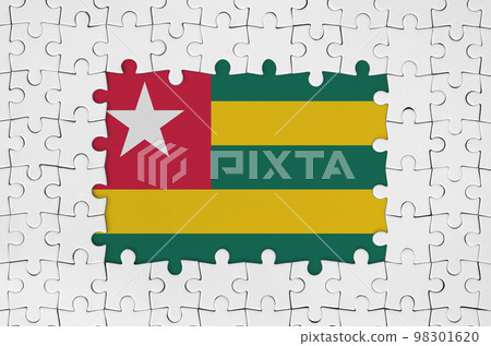Togo flag in frame of white puzzle pieces with missing central part Togo flag in frame of white puzzle pieces with missing central part 98301620