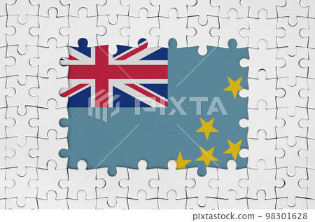 Tuvalu flag in frame of white puzzle pieces with missing central part 98301628