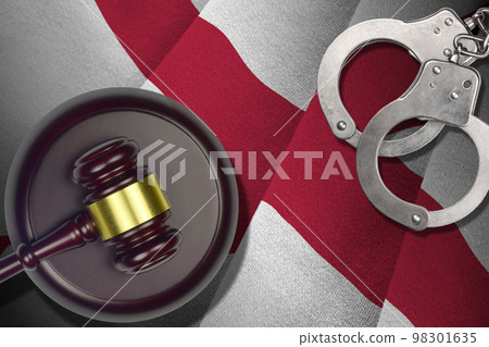 Alabama US state flag with judge mallet and handcuffs in dark room. Concept of criminal and punishment 98301635
